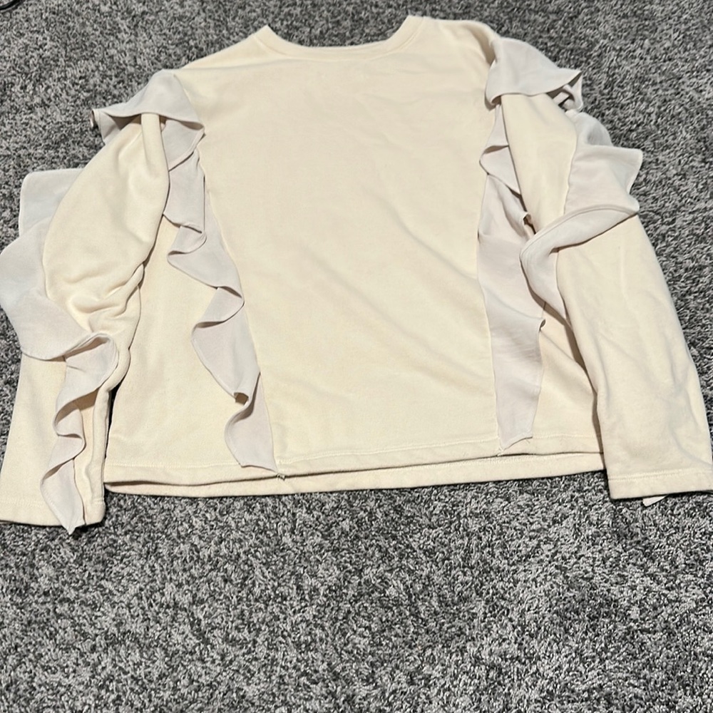 Long sleeve sweater with ruffle detail